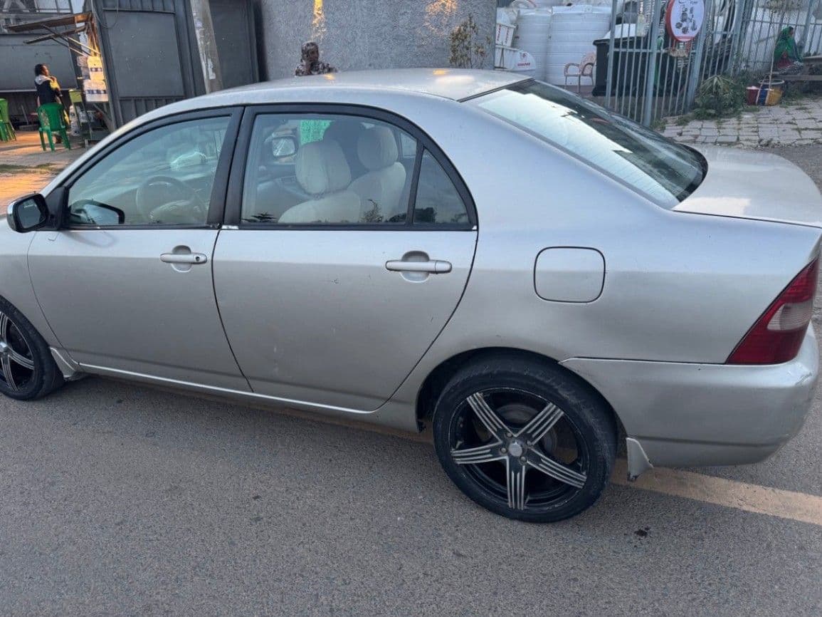 Toyota Corolla 2003, photo 1 of 5