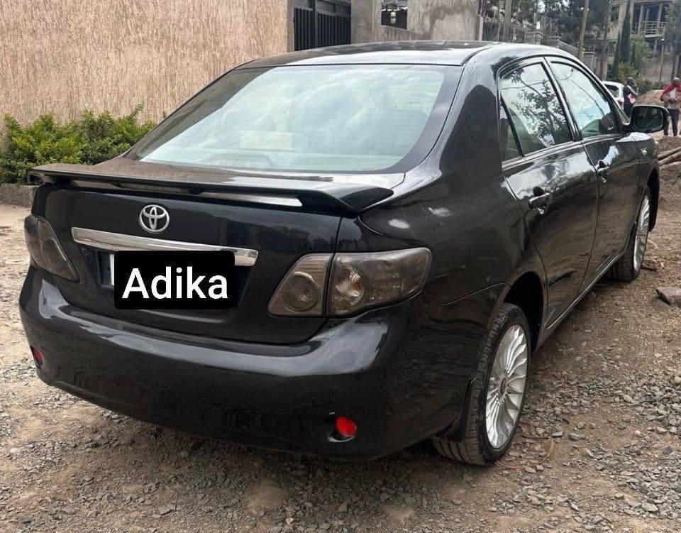toyota corolla, photo 2 of 4